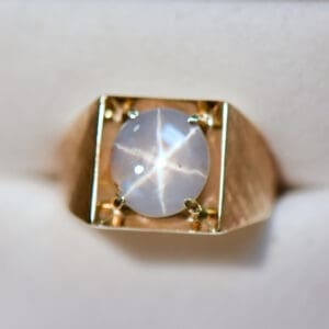 mid century textured gold gents ring with amazing natural star sapphire