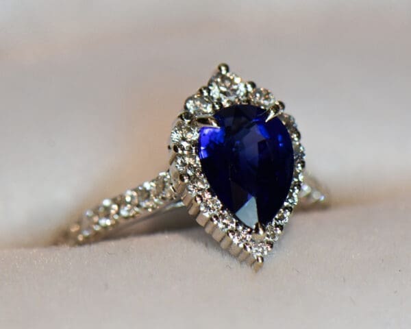 modern pear shape blue sapphire engagement ring 4