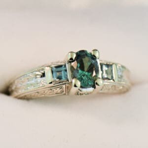 natural alexandrite three stone ring in carved white gold