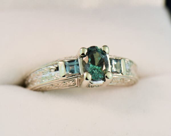 natural alexandrite three stone ring in carved white gold