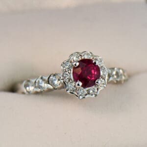 neon magenta red round burmese ruby and diamond halo ring