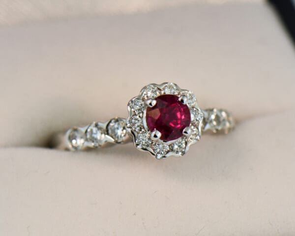 neon magenta red round burmese ruby and diamond halo ring
