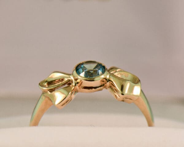 retro gold bow ring with bezel set blue zircon 2
