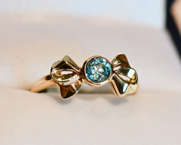retro gold bow ring with bezel set blue zircon 3