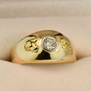 vintage gypsy ring with bezel set old euro diamond and nugget accents