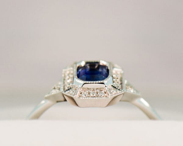 deco style dainty emerald cut blue sapphire engagement ring 3