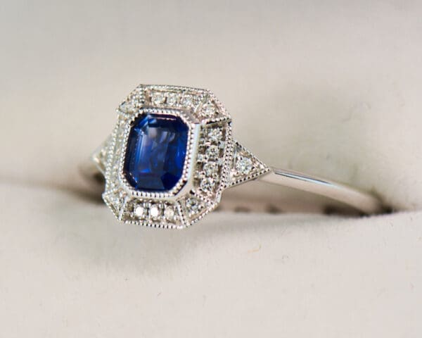 deco style dainty emerald cut blue sapphire engagement ring 4