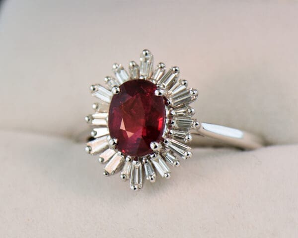 2ct oval ruby engagement ring with baguette diamond halo