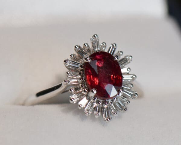 2ct oval ruby engagement ring with baguette diamond halo 4