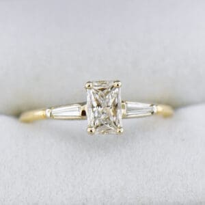 classic radiant cut diamond engagement ring with baguette accents
