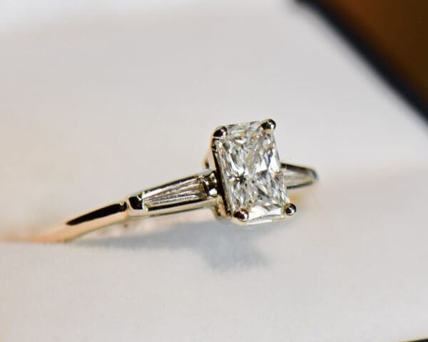 classic radiant cut diamond engagement ring with baguette accents 4