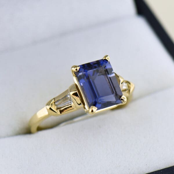 emerald cut iolite and bageutte diamond ring 3