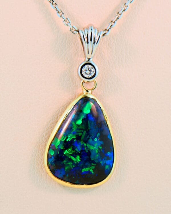 estate freeform black opal and diamond pendant in twotone gold 4