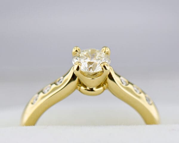 natural diamond engagement ring in classic yellow gold setting 2