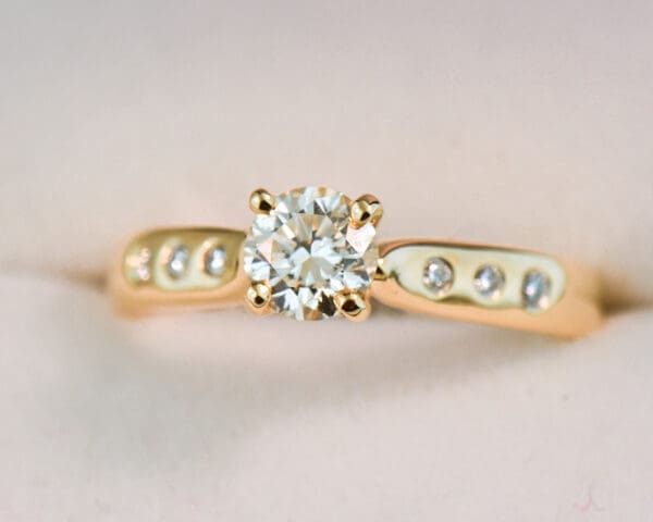 natural diamond engagement ring in classic yellow gold setting 4