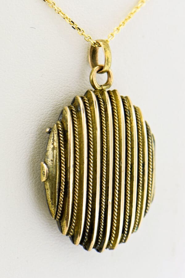 oval gold striped locket with rope trim