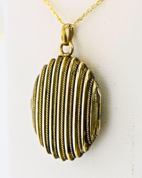oval gold striped locket with rope trim 2