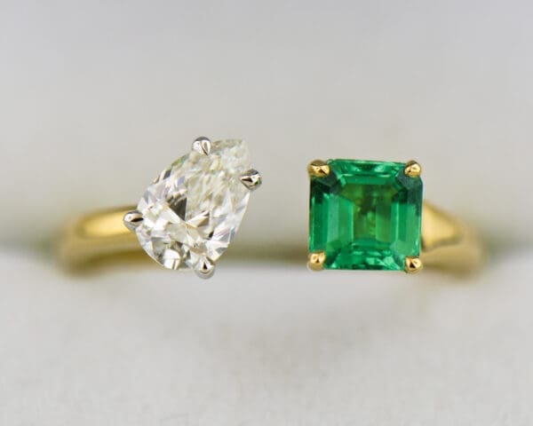 pear diamond and square emerald two stone ring 4