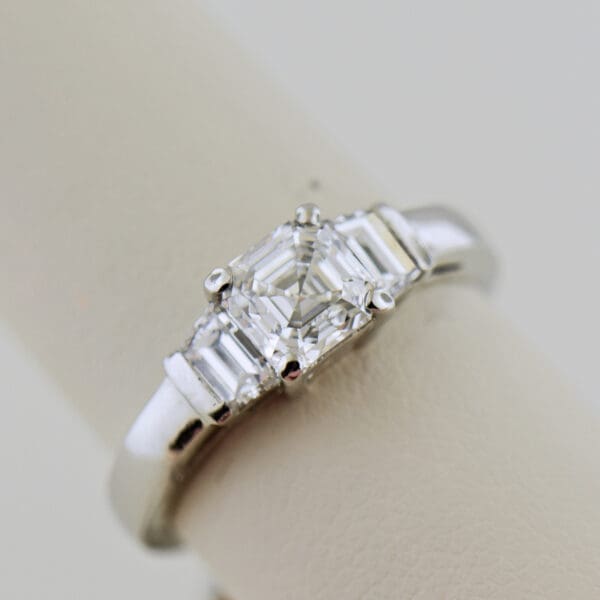 platinum wedding set with asscher cut diamond trapezoid accents and framing bands 4