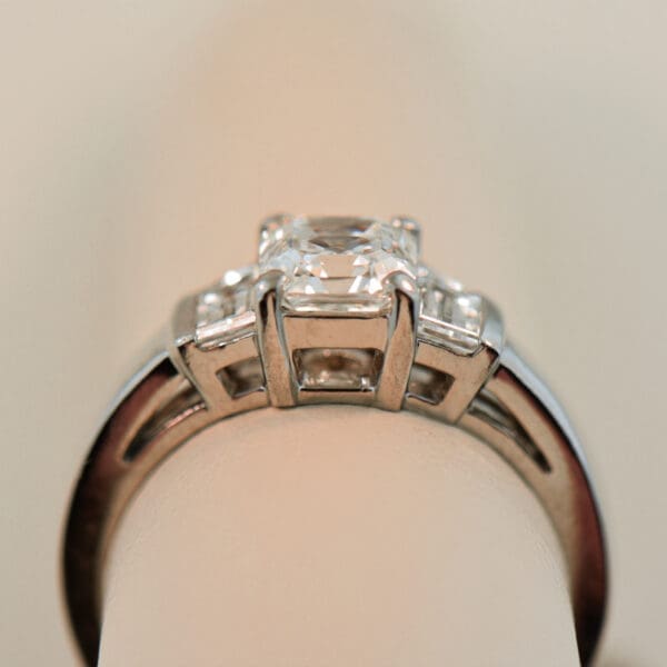 platinum wedding set with asscher cut diamond trapezoid accents and framing bands 5