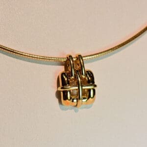 tiffany and co 18k gold pendant and wire omega neckace circa 2001