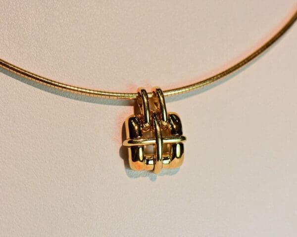 tiffany and co 18k gold pendant and wire omega neckace circa 2001