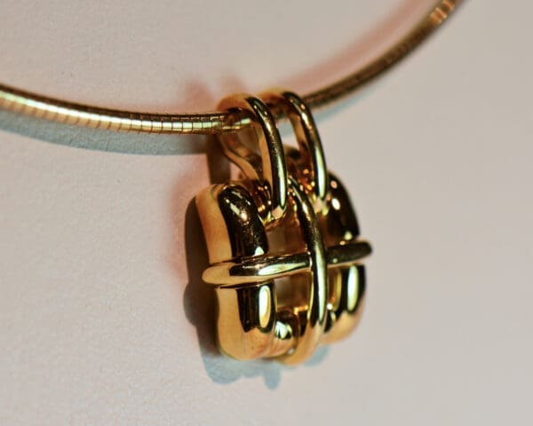 tiffany and co 18k gold pendant and wire omega neckace circa 2001 3