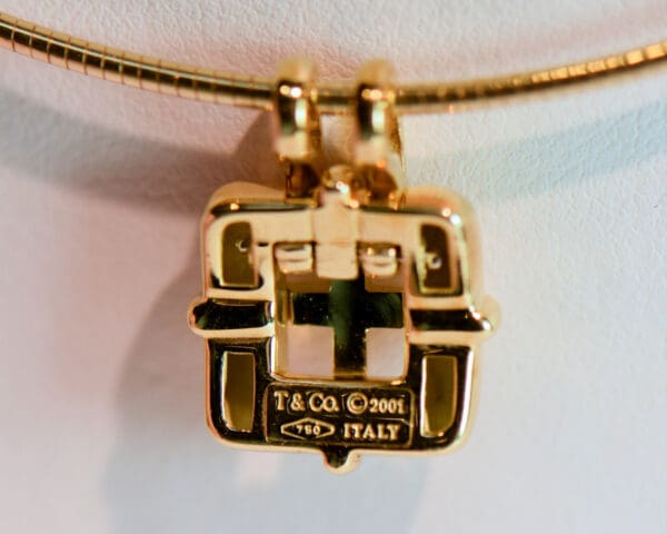 tiffany and co 18k gold pendant and wire omega neckace circa 2001 4