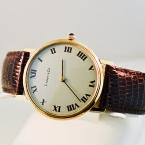tiffany and co unisex 18k gold wristwatch by universal geneve