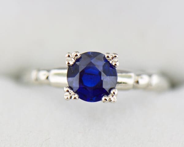 art deco royal blue sapphire platinum solitaire engagement ring