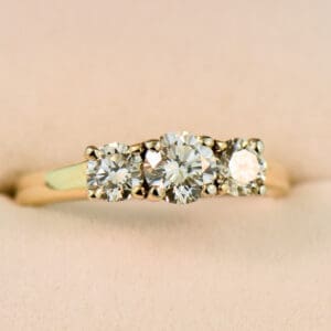 classic diamond three stone anniversary ring mid century