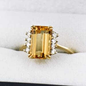 emerald cut imperial topaz engagement ring