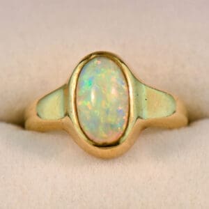 low profile victorian bezel set gold ring with australian fire opal