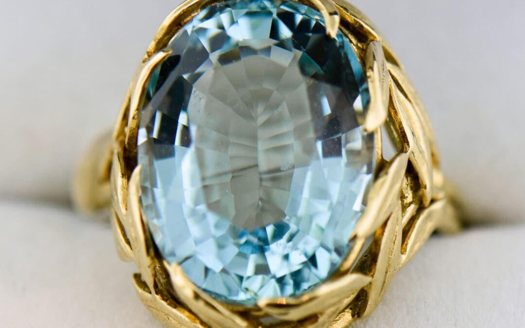 mid century aquamarine cocktail ring with floral gold mounting