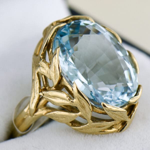 mid century aquamarine cocktail ring with floral gold mounting 2