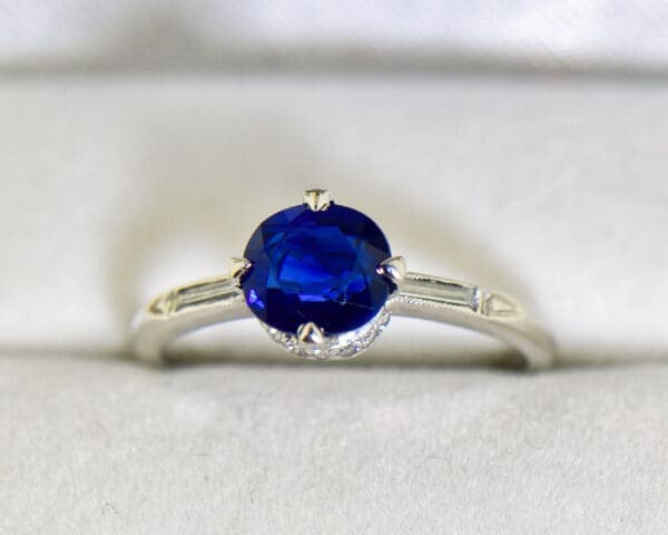 art deco platinum blue sapphire engagement ring with baguette diamonds 4