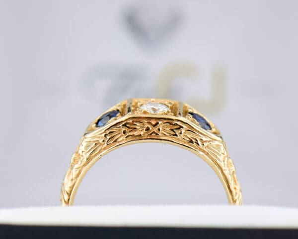 carved gold sapphire and diamond three stone wedding band 2