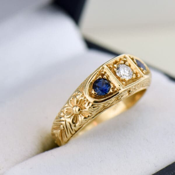 carved gold sapphire and diamond three stone wedding band 3