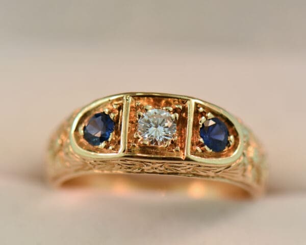 carved gold sapphire and diamond three stone wedding band 4