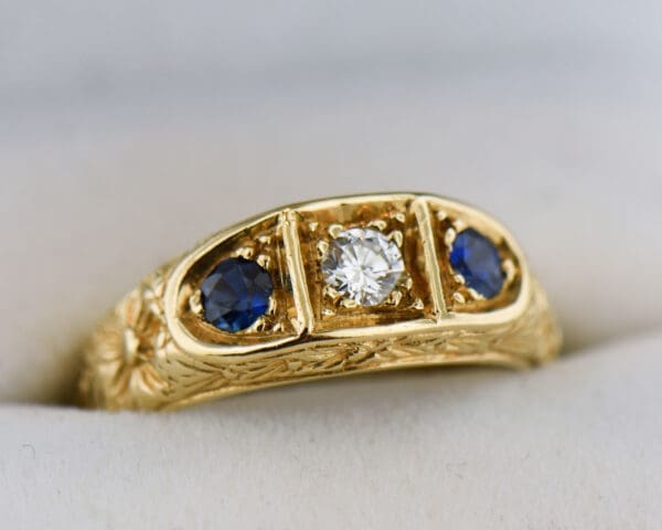 carved gold sapphire and diamond three stone wedding band