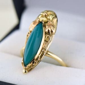 rare antique black hills gold style ring with gem silica chrysocholla