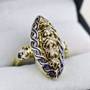 vintage yellow gold cocktail ring with diamond and blue enamel