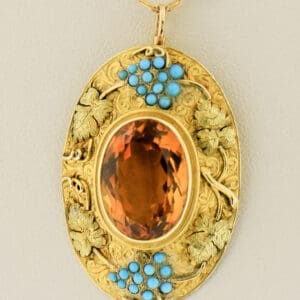 art nouveau pendant with bezel set citrine and turquise grape clusters