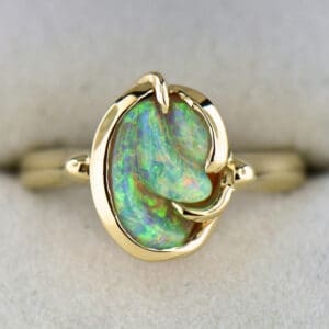 carved australian crystal opal nobby in hand made freeform solitaire engagement ring