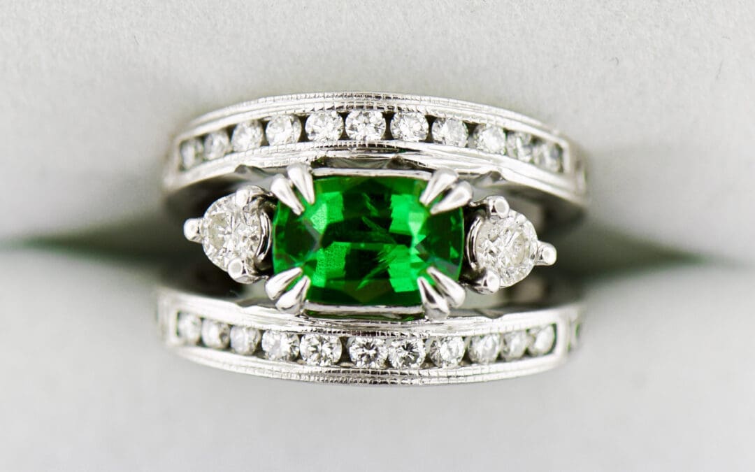 chunky white gold ring with tsavorite and channel set diamonds