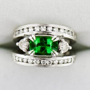 chunky white gold ring with tsavorite and channel set diamonds