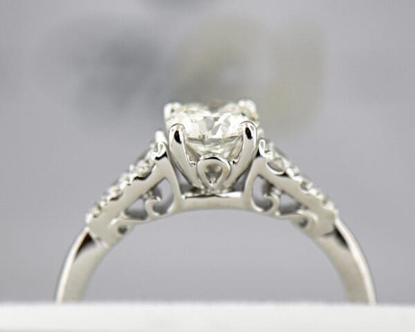 classic diamond engagement ring with .70ct natural vs diamond center 2