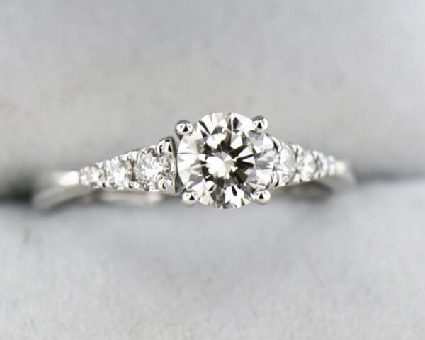 classic diamond engagement ring with .70ct natural vs diamond center 4