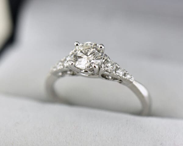 classic diamond engagement ring with .70ct natural vs diamond center