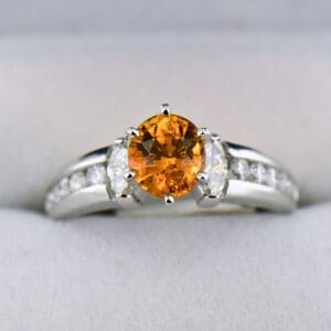 rare golden orange sapphire and diamond engagement ring